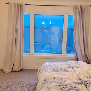 Faux shantung bone colour lined curtains